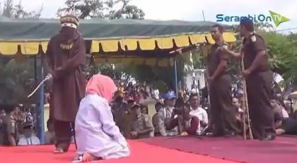 Tears as Married Woman Who Was Caught Having S*x With Another Man is Flogged in Public (Photos)